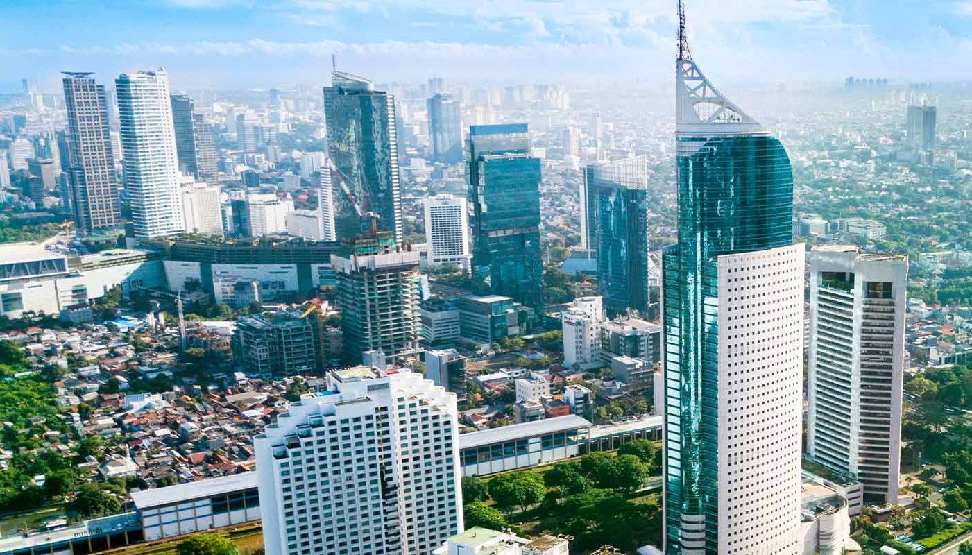 The skyline of Jakarta shows many skyscrapers.